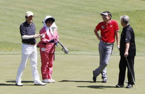 Japan PM Abe Japanese Prime Minister Shinzo Abe (far L) is pictured while playing golf in Fujikawaguchiko, Yamanashi Prefecture, central Japan, on May 6, 2018. 