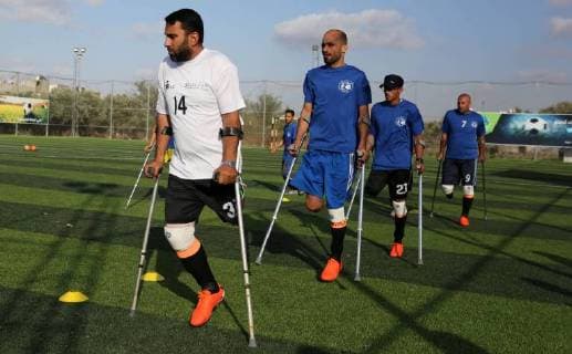 May 7, 2018 - Deir Al-Balah, Gaza Strip, Palestinian Territory - Disabled Palestinians who were lost their limbs during the Israeli wars on Gaza Strip participate in football training, in Deir al-Balah in the center of Gaza Strip on May 7, 2018 Deir Al-Balah Palestinian Territory - ZUMAap3_ 20180507_zaf_ap3_113 Copyright: xAshrafxAmrax