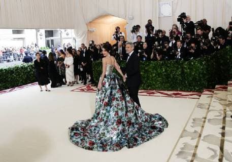 Amal Clooney and George Clooney arrive on the red carpet at The Metropolitan Museum of Art s Costume Institute Benefit Heavenly Bodies: Fashion and the Catholic Imagination at Metropolitan Museum of Art in New York City on May 7, 2018.  NYP20180507209 JOHNxANGELILLO