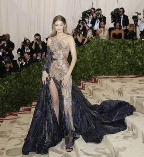 Gigi Hadid arrives on the red carpet at The Metropolitan Museum of Art s Costume Institute Benefit Heavenly Bodies: Fashion and the Catholic Imagination at Metropolitan Museum of Art in New York City on May 7, 2018.  NYP20180507745 JOHNxANGELILLO