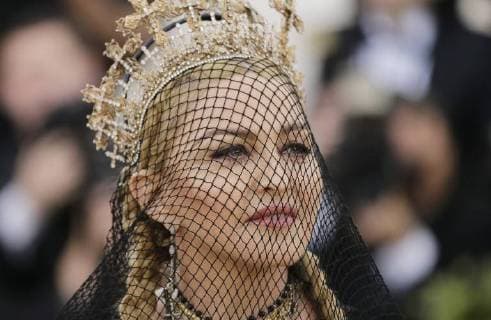 Madonna arrives on the red carpet at The Metropolitan Museum of Art s Costume Institute Benefit Heavenly Bodies: Fashion and the Catholic Imagination at Metropolitan Museum of Art in New York City on May 7, 2018.  NYP20180507792 JOHNxANGELILLO