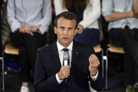 Verleihung des Karlspreises 2018 an Emmanuel Macron. Das Bild zeigt den französischen Staatspräsidegennten Emmanuel Macron im Hörsaalgebäude C.A.R.L. Der RWTH in Diskussion mit Studenten, die ihn nach Themen zu Europa fragen 2018 - Verleihung des Karlspreises 2018 an Emmanuel Macron