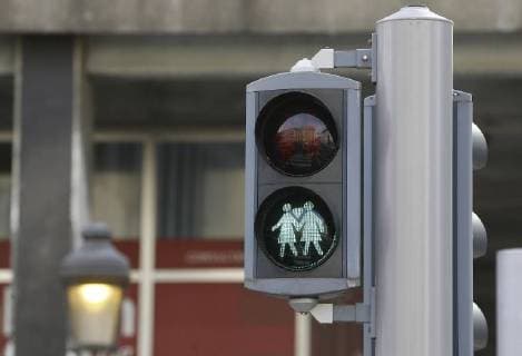 Illustration picture shows adapted street crossing lights for pedestrians, showing two girls holding hands, to mark IDAHOT (International Day against Homophobia and Transphobia), ahead of a Minister s council meeting of the Federal Government in Brussels, Friday 18 May 2018.  NICOLASxMAETERLINCK 05348231