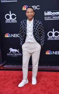 Recording artist John Legend arrives for the 2018 Billboard Music Awards at MGM Grand Garden Arena on May 20, 2018 in Las Vegas, Nevada.  LAV20180520217 JIMxRUYMEN
