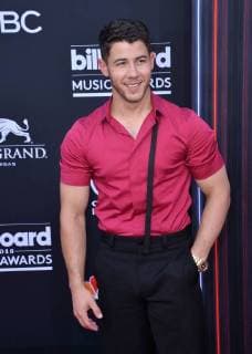 Recording artist Nick Jonas arrives for the 2018 Billboard Music Awards at MGM Grand Garden Arena on May 20, 2018 in Las Vegas, Nevada.  LAV20180520275 JIMxRUYMEN