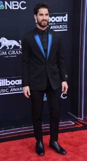 Actor Darren Criss arrives for the 2018 Billboard Music Awards at MGM Grand Garden Arena on May 20, 2018 in Las Vegas, Nevada.  LAV20180520354 JIMxRUYMEN