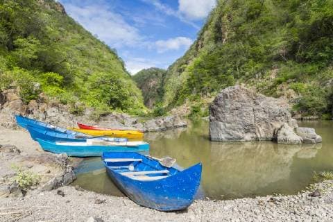 Small boats mooring at the entrance to the Somoto Canyon, Nicaragua, Central America Copyright: OliverxWintzen 1283-308