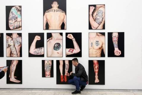 MOSCOW, RUSSIA - JUNE 1, 2018: A man views an exhibition on the 1897-2018 history of Russian football at the VDNKh exhibition centre. The exhibition covers the history of Russian and Soviet football from the first football team in the Russian Empire (1897) up to the present times. Alexander Shcherbak TASS  TS08233A