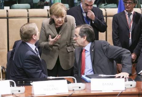 - BRUSSELS, BELGIUM: Ireland s Prime Minister Enda Kenny, German Chancellor Angela Merkel and Greece Prime Minister Antonis Samaras pictured during the signature of an agreement with Ukraine on the second day of the EU summit of heads of state and government, at the EU headquarters in Brussels, Friday 21 March 2014. POOLxOLIVERxHOSLET  x56306072x