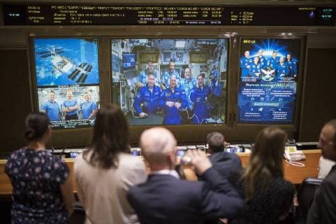 June 9, 2018 - Russia - Expedition 56 flight engineers Sergey Prokopyev of Roscosmos, bottom left, Alexander Gerst of ESA (European Space Agency), bottom center, and Serena Aunon-Chancellor of NASA, bottom right, are seen with flight engineer Oleg Artemyev of Roscosmos, top left, Commander Drew Feustel of NASA, top center, and flight engineer Ricky Arnold of NASA, top right, are seen on a video monitor as they talk to family and friends at the Moscow Mission Control Center in Korolev, Russia a few hours after the Soyuz MS-09 docked to the International Space Station. Russia - ZUMAz03_ 20180609_sha_z03_473 Copyright: xJoelxKowskyx