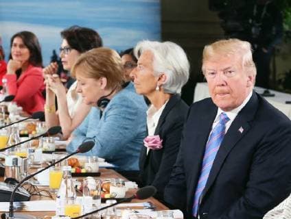 G-7 summit in Canada U.S. President Donald Trump (R) attends a session at the Group of Seven summit in Charlevoix, Canada, on June 9, 2018. (Pool photo) 