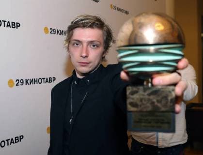 SOCHI, RUSSIA - JUNE 10, 2018: Director Alexander Gorchilin holds his award for the best debut for his film Acid at the closing ceremony of the 29th Kinotavr Film Festival. Vyacheslav Prokofyev TASS  TS0836B5