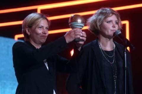 SOCHI, RUSSIA - JUNE 10, 2018: Screenwriter Anna Parmas (L) and director Avdotya Smirnova, the winners of the Best Script award for the film The Story of an Appointment, at the closing ceremony of the 29th Kinotavr Film Festival. Vyacheslav Prokofyev TASS  TS0836F0