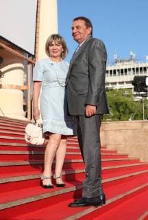 SOCHI, RUSSIA - JUNE 10, 2018: Sochi Mayor Anatoly Pakhomov (R) and his wife Yelena at the closing ceremony of the 29th Kinotavr Film Festival. Vyacheslav Prokofyev TASS  TS083736