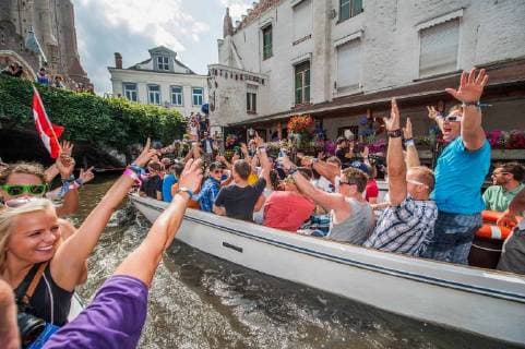 - BRUGGE, BELGIUM: Illustration picture shows Tomorrowland guests during a boat trip in Brugge on the Belgian day for International Tomorrowland Guests of the 9th edition of the Tomorrowland music festival, Thursday 25 July 2013, in Brugge. This year s Tomorrowland takes place in Boom from the 26th until the 29th of July. JONASxROOSENS x44864019x