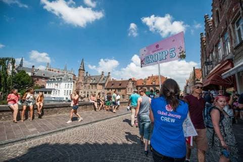 - BRUGGE, BELGIUM: Illustration picture shows Tomorrowland guests during a trip in Brugge on the Belgian day for International Tomorrowland Guests of the 9th edition of the Tomorrowland music festival, Thursday 25 July 2013, in Brugge. This year s Tomorrowland takes place in Boom from the 26th until the 29th of July. JONASxROOSENS x44864030x