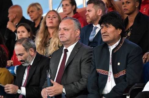 MOSCOW, RUSSIA â€“ JUNE 13, 2018: Armenia s Prime Minister Nikol Pashinyn, Moldova s President Igor Dodon, and Bolivia s President Evo Morales (L-R) watch a concert by opera stars ahead of the 2018 FIFA World Cup, at Moscow s Red Square. Alexei Nikolsky Russian Presidential Press and Information Office TASS  TS083F5E