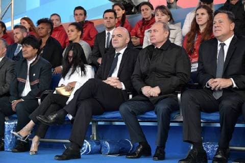 MOSCOW, RUSSIA â€“ JUNE 13, 2018: Panama s President Juan Carlos Varela, Russia s President Vladimir Putin, FIFA President Gianni Infantino (R-L), and Bolivia s President Evo Morales (L) watch a concert by opera stars ahead of the 2018 FIFA World Cup, at Moscow s Red Square. Alexei Nikolsky Russian Presidential Press and Information Office TASS  TS083F4D