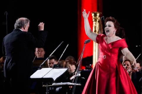 MOSCOW, RUSSIA â€“ JUNE 13, 2018: Mariinsky Theatre artistic director, conductor Valery Gergiev (L) and Russian soprano Albina Shagimuratova perform during concert by opera stars ahead of the 2018 FIFA World Cup, at Moscow s Red Square. Mikhail Metzel TASS  TS083FDC