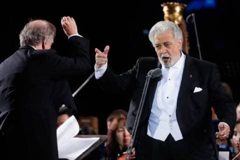 MOSCOW, RUSSIA â€“ JUNE 13, 2018: Mariinsky Theatre artistic director, conductor Valery Gergiev (L) and Spanish tenor Placido Domingo perform during concert by opera stars ahead of the 2018 FIFA World Cup, at Moscow s Red Square. Mikhail Metzel TASS  TS083FDF