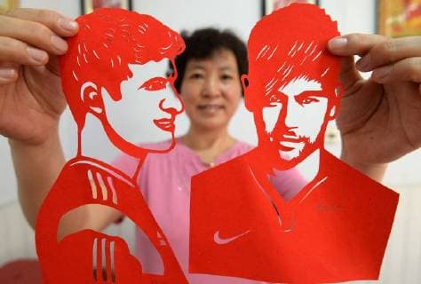 Paper-cutting of football stars mark World Cup 2018 The folk artist Feng Shiping makes paper-cutting works of football stars including Lionel Messi, Neymar da Silva Santos Junior, Thomas Muller, Luis Suarez and Cristiano Ronaldo in Handan, north China s Hebei Province, marking the upcoming World Cup 2018. CHINA OUT Handan Handan China  HaoxQunying