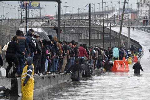 June 14, 2018 - EUM20180614ACT02.JPG.CIUDAD DE MEXICO.- RainsLluvias-CDMX.- 14 de junio 2018. Por segundo dia consecutivo se registraron fuertes lluvias en la Ciudad de Mexico, ahora provocando afectaciones en el oriente, lo que causo la suspension del servicio de algunas estaciones de la Linea A del Sistema de Transporte Colectivo (STC) Metro. Foto: Agencia EL UNIVERSALAlan RodriguezRCC.  - ZUMAu78_ 20180614_zaf_u78_623 Copyright: xElxUniversalx