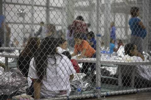 June 18, 2018 - McAllen, Texas, U.S. - In this photo provided by on, people who ve been taken into custody related to cases of illegal entry into the United States, sit in one of the cages at a facility in McAllen, Texas, Sunday, June 17, 2018. McAllen U.S.  - ZUMA 20180618_jlr_z03_003 Copyright: xU.S.xCustomsxandxBorderxProtectix