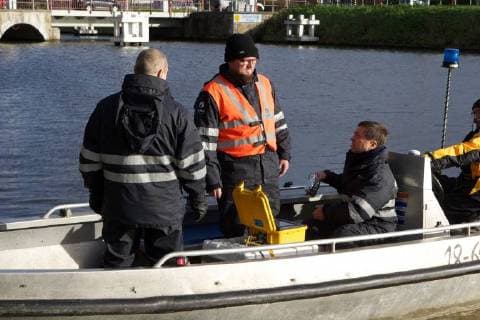 - BRUGGE, BELGIUM: Illustration picture shows divers and police during the search for Frederic Coopman, Tuesday 13 December 2011 in the Ringvaart river in Brugge. 20 year old student Coopman has been missing since he left a party on Saturday, his gray woolen hat and one of his black gloves were found at the Gentpoort in Brugge. KURTxDESPLENTER x31604046x