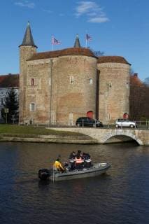 - BRUGGE, BELGIUM: Illustration picture shows divers and police during the search for Frederic Coopman, Tuesday 13 December 2011 in the Ringvaart river in Brugge. 20 year old student Coopman has been missing since he left a party on Saturday, his gray woolen hat and one of his black gloves were found at the Gentpoort in Brugge. KURTxDESPLENTER x31604191x