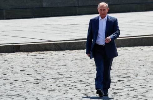MOSCOW, RUSSIA - JUNE 28, 2018: Russia s President Vladimir Putin visits the 2018 FIFA World Cup Football Park in Red Square. Mikhail Metzel TASS  TS086D96
