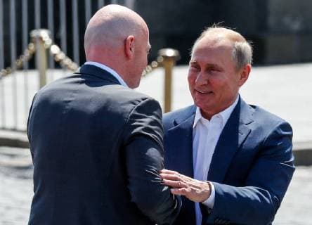 MOSCOW, RUSSIA - JUNE 28, 2018: FIFA President Gianni Infantino (L) and Russia s President Vladimir Putin visit the 2018 FIFA World Cup Football Park in Red Square. Mikhail Metzel TASS  TS086D95