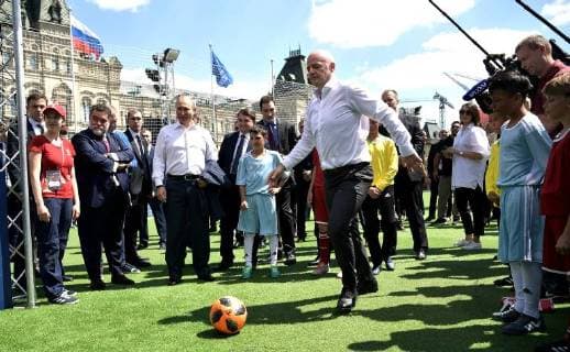 June 28, 2018. - Russia, Moscow. - Russian President Vladimir Putin and FIFA President Gianni Infantino (right) visit the themed 2018 FIFA World Cup Football Park on Red Square. KremlinxPool 
