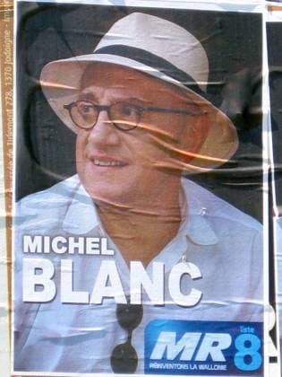 - VIRTON, BELGIUM: Illustration picture shows an election board with a poster of actor Michel Blanc, Friday 29 May 2009, in Virton. In the last weeks before the regional and European elections, some people hang posters of well-known people (actors, international personalities,...) over the election posters of the local candidates in Virton and surroundings. NATHALIExBODART  x14005259x