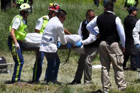 (180705) -- TULTEPEC (MEXICO), July 5, 2018 -- Rescuers carry the body of a victim after explosions at a small fireworks factory in La Saucera, a neighborhood on the outskirts of Tultepec, Mexico, on July 5, 2018. Two explosions on Thursday at the small fireworks factory in central Mexico left at least 19 people dead, including firefighters and police officers, and another 40 people injured, local authorities said. ) MEXICO-TULTEPEC-FIREWORKS FACTORY-EXPLOSIONS FernandoxRamirez 