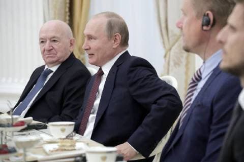 MOSCOW, RUSSIA â€“ JULY 6, 2018: Russian Football Union Vice President Nikita Simonyan and Russia s President Vladimir Putin (L-R) meet with football stars at the Moscow Kremlin. Mikhail Metzel TASS  TS088225