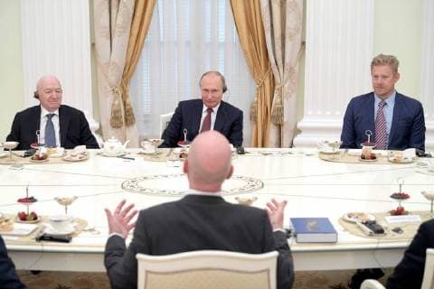 MOSCOW, RUSSIA â€“ JULY 6, 2018: Russian Football Union Vice President Nikita Simonyan, Russia s President Vladimir Putin, and retired Danish footballer Peter Schmeichel (L-R) meet with football stars at the Moscow Kremlin.Alexei Druzhinin Russian Presidential Press and Information Office TASS  TS088271