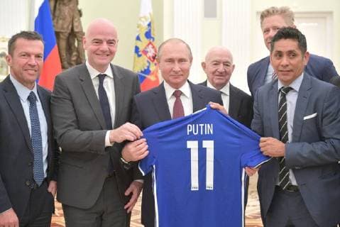 MOSCOW, RUSSIA â€“ JULY 6, 2018: Former German footballer Lothar Matthaus, President Gianni Infantino, Russia s President Vladimir Putin, Russian Football Union Vice President Nikita Simonyan, retired Danish footballer Peter Schmeichel, and retired Mexican footballer Jorge Campos Navarrete (L-R) pose for a group photo after a meeting at the Moscow Kremlin. Alexei Druzhinin Russian Presidential Press and Information Office TASS  TS088281