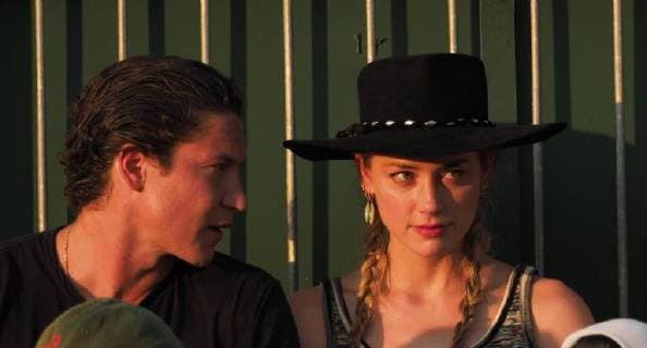 LONDON, ENGLAND - JULY 06: Amber Heard and new her beau 31 year old Vito Schnabel (Heidi Klum s ex Boyfriend)snuggle and stare at each other as they attend day five of the Wimbledon Tennis Championships at the All England Lawn Tennis and Croquet Club on July 6, 2018 in London, England..People: Amber Heard, Vito Schnabel London England - ZUMAs214 20180706_zba_s214_052 Copyright: xSMGx