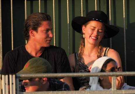 LONDON, ENGLAND - JULY 06: Amber Heard and new her beau 31 year old Vito Schnabel (Heidi Klum s ex Boyfriend)snuggle and stare at each other as they attend day five of the Wimbledon Tennis Championships at the All England Lawn Tennis and Croquet Club on July 6, 2018 in London, England..People: Amber Heard, Vito Schnabel London England - ZUMAs214 20180706_zba_s214_089 Copyright: xSMGx