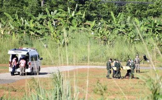 Rescue of boys trapped in Thai cave A stretcher carrying what is believed to be a fifth boy rescued from a cave in northern Thailand is carried from an ambulance parked near the Tham Luang Nang Non cave in the northern province of Chiang Rai on July 9, 2018. 