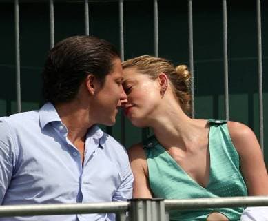 LONDON, ENGLAND - JULY 07: it s official THEY HAVE THEIR FIRST KISS Amber Heard wearing a low cut mint jumpsuit with new boyfriend Vito Schnabel attend day seven of the Wimbledon Tennis Championships at the All England Lawn Tennis and Croquet Club on July 7, 2018 in London, England..People: Vito Schnabel and Amber Heard London England - ZUMAs214 20180709_zba_s214_001 Copyright: xSMGx