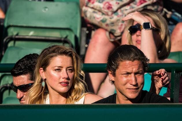 LONDON, ENG - JULY 11: american actress AMBER HEARD and american art curator VITO SCHNABEL during day nine match of the 2018 Wimbledon on July 11, 2018, at All England Lawn Tennis and Croquet Club in London,England. (Photo by Chaz Niell Icon Sportswire) 305687