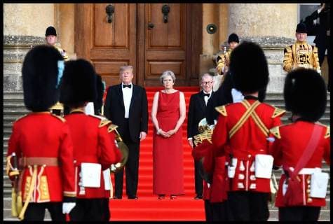 . 12 07 2018. London, United Kingdom. President Trumps visit to Britain. (L-R on the steps) US President Donald Trump, Britain s Prime Minister Theresa May and her husband Philip May stand on steps in the Great Court as the bands of the Scots, Irish and Welsh Guards perform a ceremonial welcome as they arrive for a black-tie dinner with business leaders at Blenheim Palace, west of London, on July 12, 2018, on the first day of President Trump s visit to the UK. The four-day trip, which will include talks with Prime Minister Theresa May, tea with Queen Elizabeth II and a private weekend in Scotland, is set to be greeted by a leftist-organised mass protest in London on Friday  xi-Imagesx xPoolx IIM-18198-0012