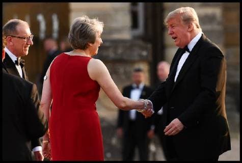 . 12 07 2018. London, United Kingdom. President Trumps visit to Britain. Britain s Prime Minister Theresa May (C) shakes hands with US President Donald Trump (R) as her husband Philip May (L) looks on as Trump and his wife US First Lady Melania Trump (unseen) arrive for a black-tie dinner with business leaders at Blenheim Palace, west of London, on July 12, 2018, as President Trump begins his first visit to the UK as US president. The four-day trip, which will include talks with Prime Minister Theresa May, tea with Queen Elizabeth II and a private weekend in Scotland, is set to be greeted by a leftist-organised mass protest in London on Friday  xi-Imagesx xPoolx IIM-18198-0016