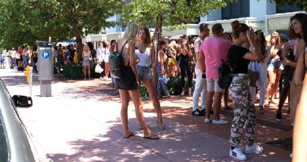 SI model hopeful wait in the hot summer heat during the Miami Swim Week at the W hotel in Miami Beach, Florida, July 13, 2018. For the first time Sports Illustrated Swimsuit will host an open model casting call July 13 & 14 2018 from 9AM ? 3PM, at the W hotel South Beach during Paraiso. More than 1500 potential stars will compete for the one spot in the 2019 issue of SI Swimsuit.  MIA20180712315 GARYxIxROTHSTEIN