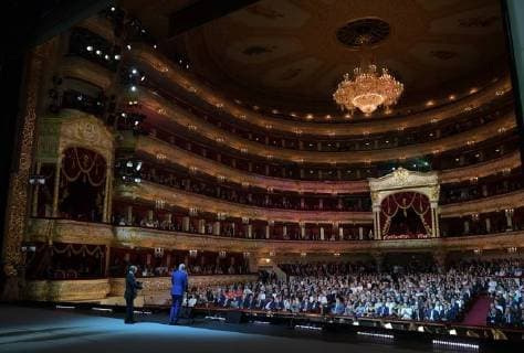 MOSCOW, RUSSIA - JULY 14, 2018: FIFA President Gianni Infantino, Russia s President Vladimir Putin (L-R) attend a gala concert of world opera stars held at Moscow s Bolshoi Theatre ahead of the 2018 FIFA World Cup Final match. Alexei Druzhinin Russian Presidential Press and Information Office TASS  TS0896C1