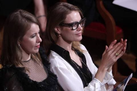 MOSCOW, RUSSIA - JULY 14, 2018: Journalist and L Officiel Russia editor-in-chief Ksenia Sobchak (L), founder of the Naked Heart Foundation,top model Natalia Vodianova attend a gala concert of world opera stars held at Moscow s Bolshoi Theatre ahead of the 2018 FIFA World Cup Final match. Mikhail Metzel TASS  TS0896AA