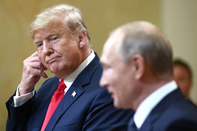 HELSINKI, FINLAND â€“ JULY 16, 2018: US President Donald Trump (L) and Russia s President Vladimir Putin give a joint news conference following their meeting at the Presidential Palace. Valery Sharifulin TASS  TS089CFF