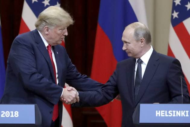 HELSINKI, FINLAND â€“ JULY 16, 2018: US President Donald Trump (L) and Russia s President Vladimir Putin shake hands during a joint news conference following their meeting at the Presidential Palace. Mikhail Metzel TASS  TS089D20