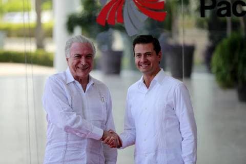 Mexican President Enrique Pena Nieto (R) welcomes the Brazilian President Michel Temer (L) during the 13th Summit of the Pacific Alliance in Puerto Vallarta, Mexico, 24 July 2018. The Summit is being held this July 23 and 24 in the resort of Puerto Vallarta, in the Mexican Pacific. 13th Summit of the Pacific Alliance, in Mexico !ACHTUNG: NUR REDAKTIONELLE NUTZUNG!  Copyright: xJosexMendezx MEX01 20180724-636680558018123456